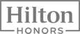 The image shows the Hilton Honors logo, featuring the text "Hilton" above "Honors" within a rectangular border.